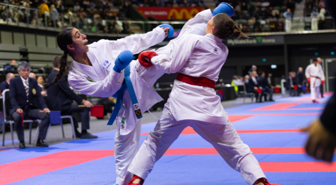 A photo showing Aquinas Catholic College Menai student Jacinta competing in a karate competition
